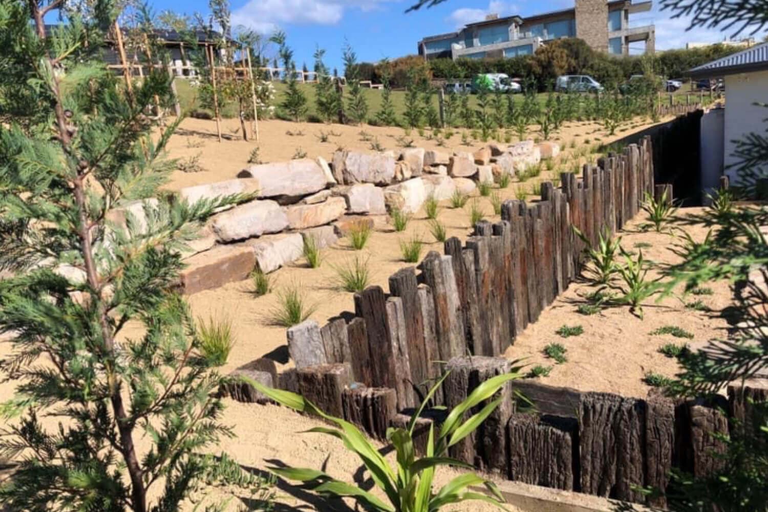 Natural stone retaining walls constructed for a residential landscape project in Melbourne